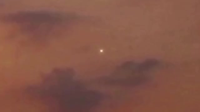 UFO Appears During A Stunning Sunset Time Lapse Video