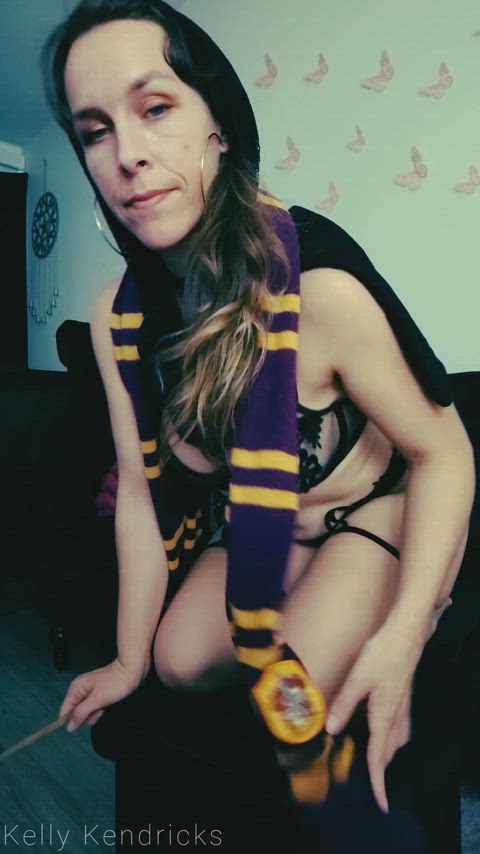 brunette cosplay magic wand gif