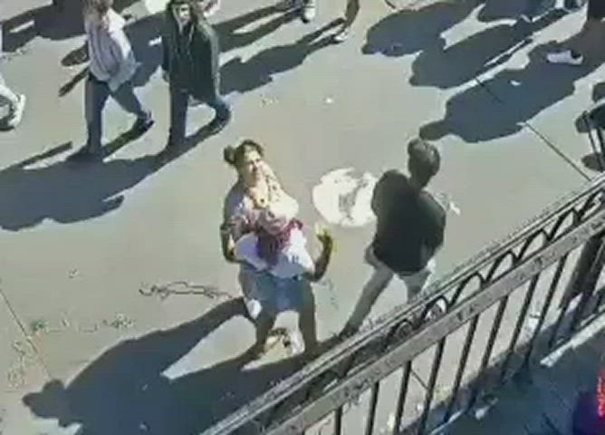 sexy and confident woman flashes boobs during mardi gras on earthcam