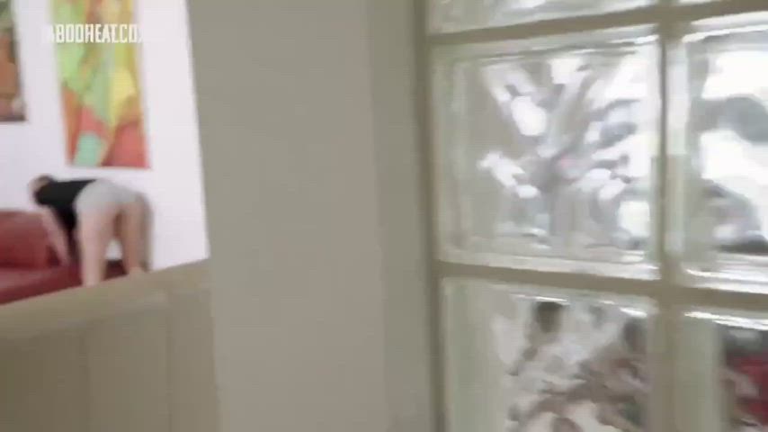 Melanie Hicks gets stuck in the couch