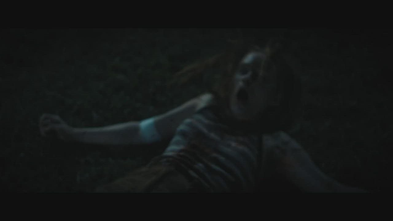 Clothed Jiggling Redhead gif
