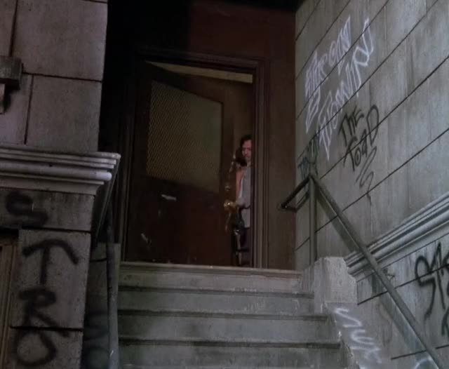 Anthony Edwards thrown naked onto street - Downtown (1990)