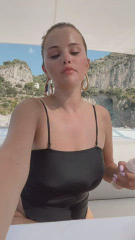 cleavage selena gomez swimsuit gif