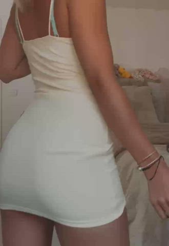 Shaking my booty 😉 I'm not wearing anything under this dress.. Just bare and cheeky