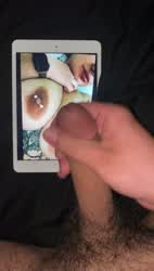 Dropping a load on her massive tits