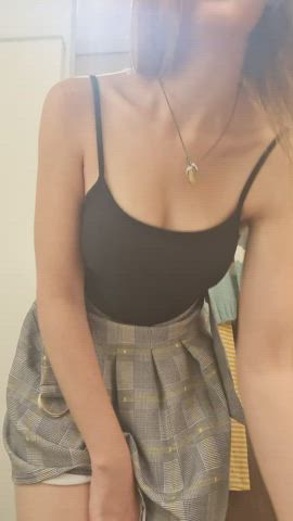Getting my boobs out in a fitting room