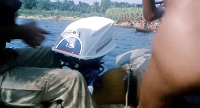 Laura Gemser Sitting in Boat - Emanuelle and the Last Cannibals