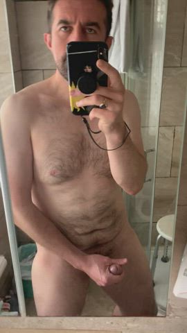 Watching myself shoot my load in the mirror