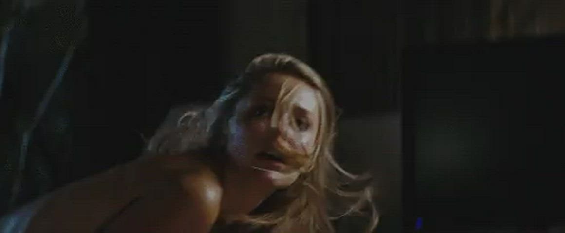 Your roommate's girlfriend (Julianna Guill) when she hears him knock on the