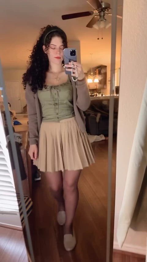 babe brunette busty curly hair cute natural tits sexy skirt tease thick gif