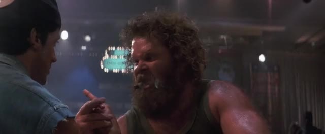 Over-the-Top-1987-GIF-01-06-33-guy-eats-cigar