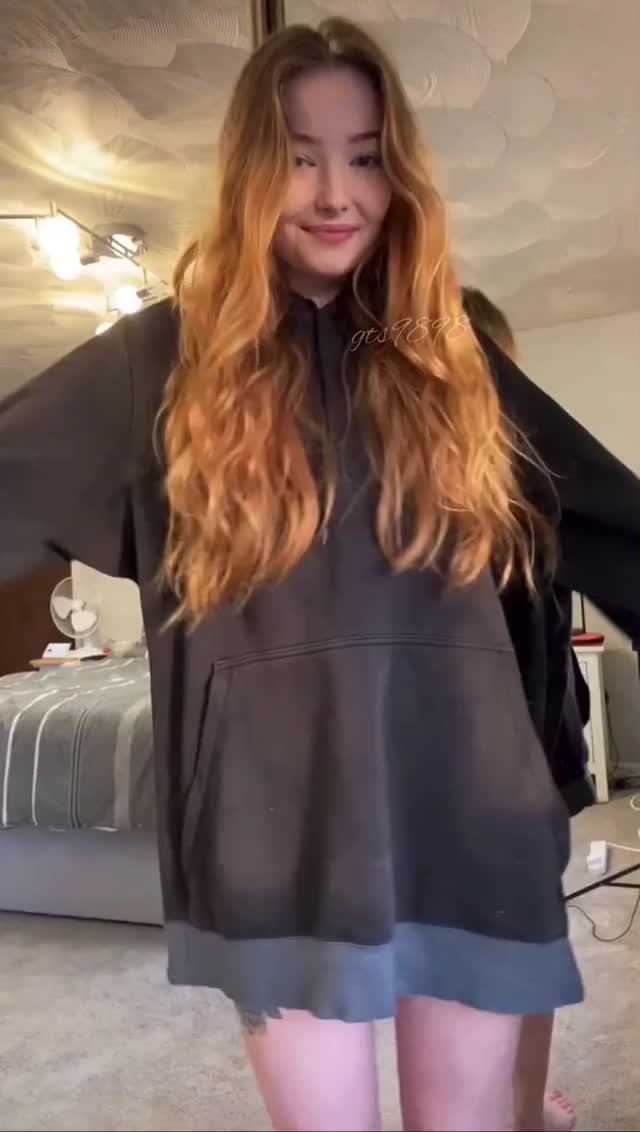 Just a 2002 girl spinning out her clothes