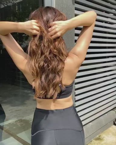 Aamna Sharif in her sexercise attire. UNDERARMOUR bra says The only way through while