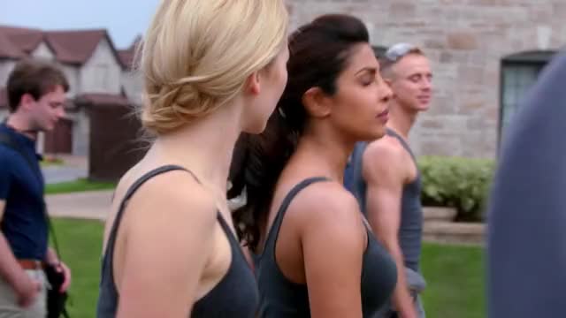 Priyanka Chopra - Quantico - S1E4 - walking, sweating, in a somewhat low-cut dark