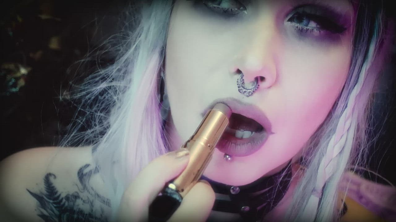 Painting my lips with cold-toned nude lipstick. <3