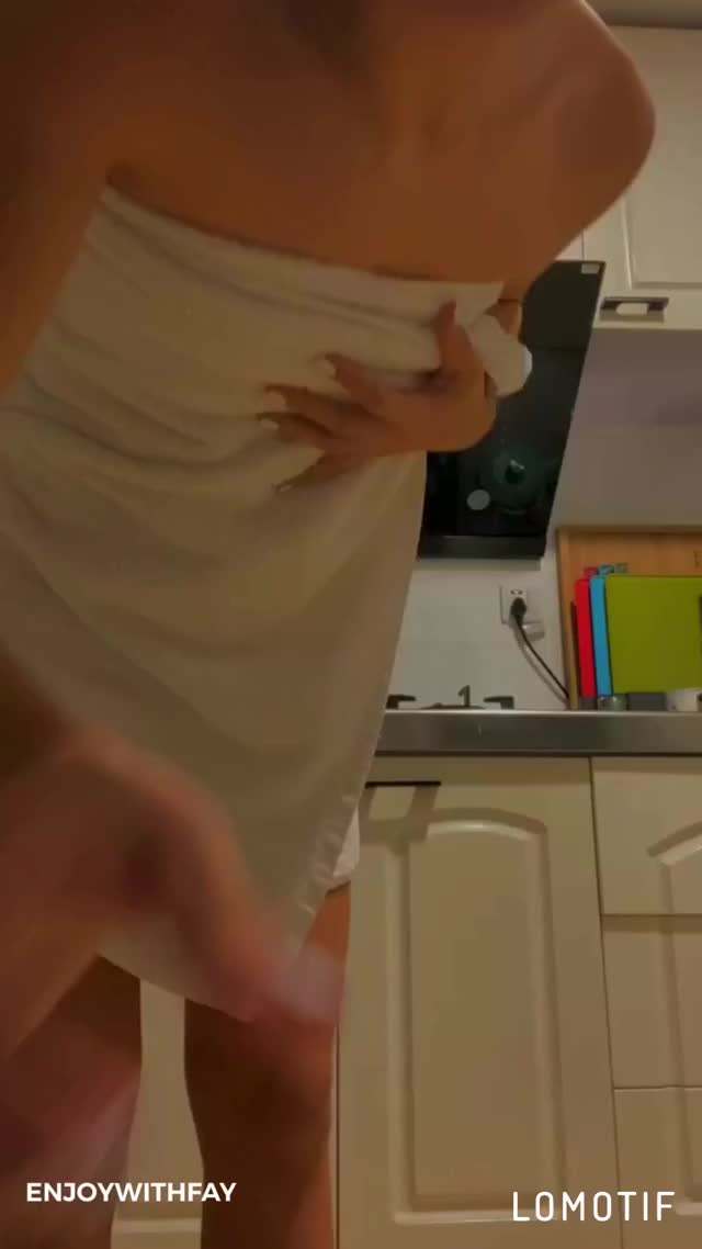 Behind the towel