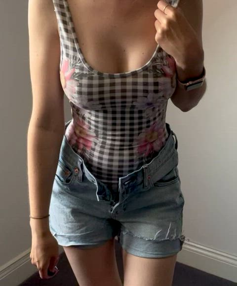 I enjoy showing off my fake tits cleavage