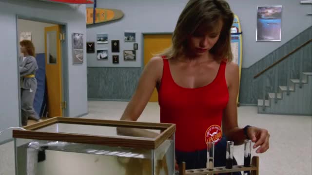 Vanessa Angel - Baywatch (S2E3, 1991) - in red swimsuit & sweatpants, talking