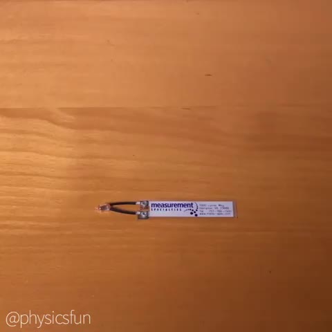 Piezo Film Flicker: a neon bulb flashes from electricity created by the mechanical