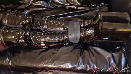 Slave Slut-Orgasma Celeste bound in black latex and leather forced to a orgasm