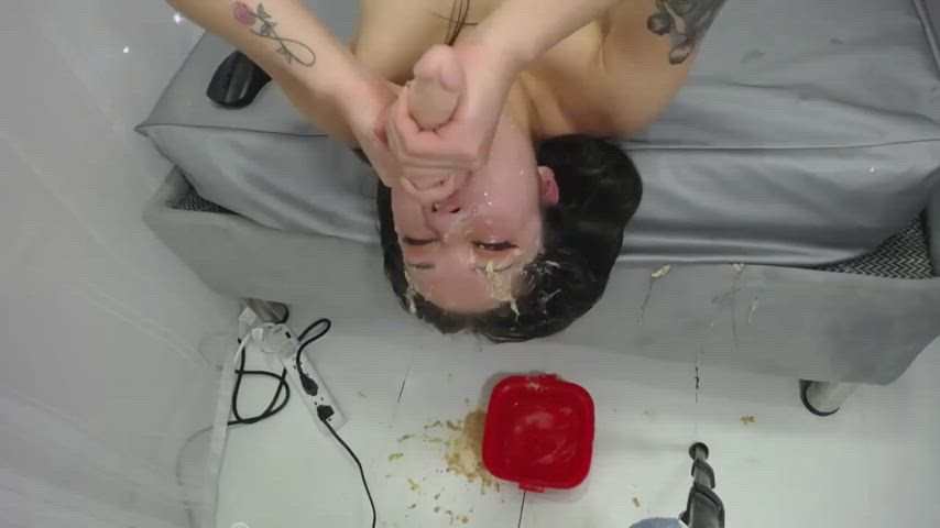 Upside down dildo puke