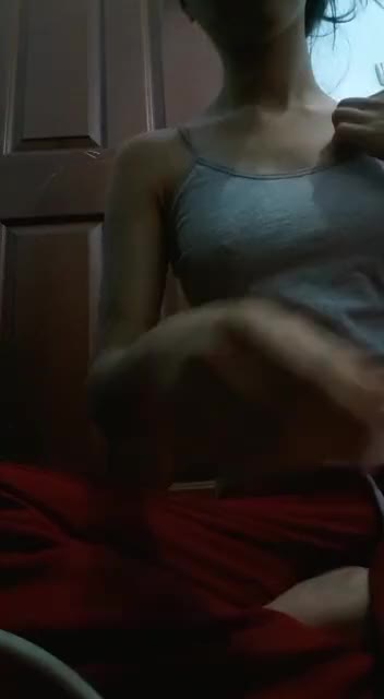 red pants grey top