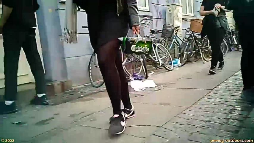 pretty blonde woman catches a man taking a pic of her while she’s peeing in the