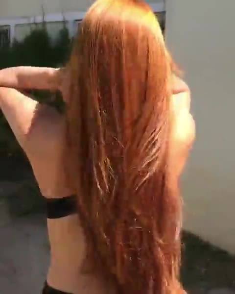 Redhead Plays with Her Beautiful Hair