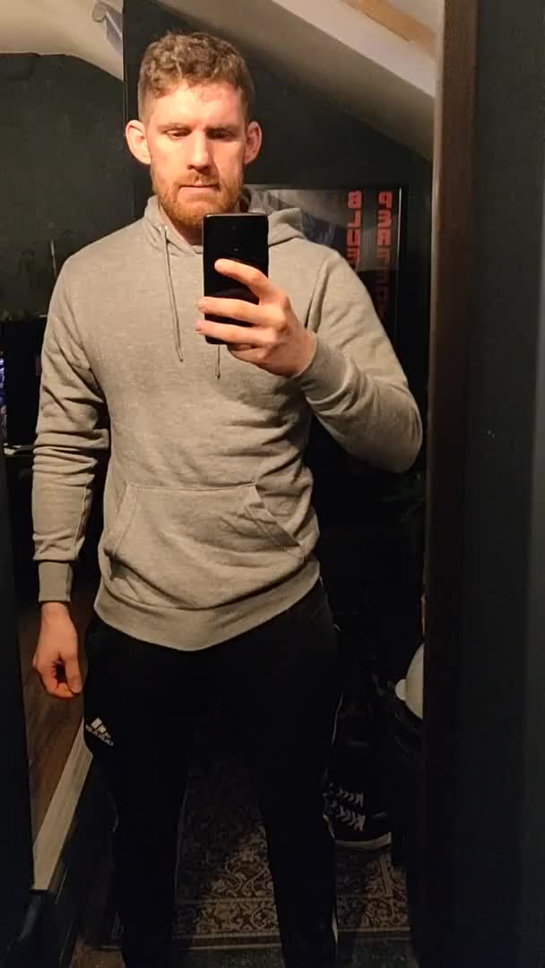 Showing off his uncut cock