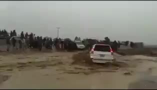 A man and his vehicle fell into the river when he tried to drive through flood in