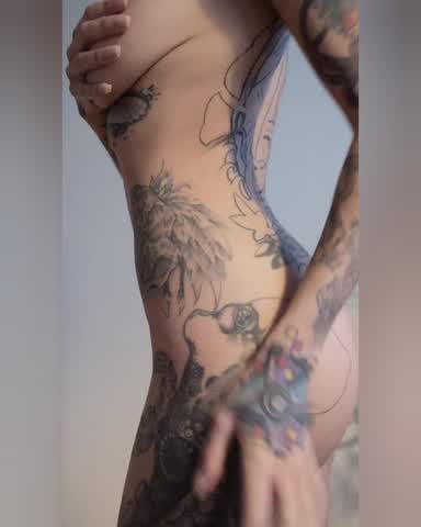 Nude tattooed and Horny of course ?