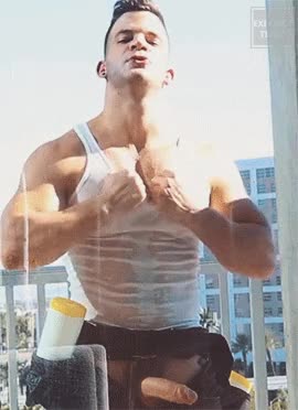 Paddy O’Brian rips tank top off .