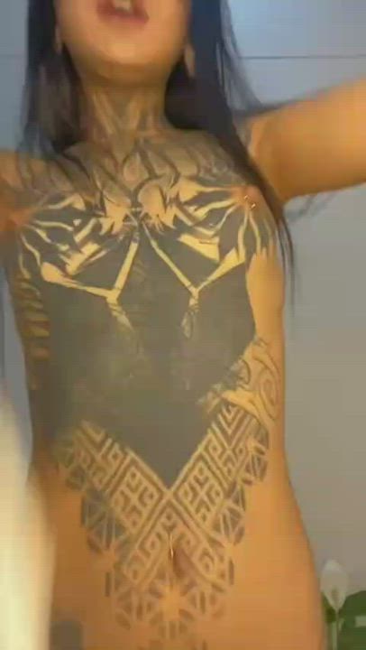 Amazing tattoo and nipple piercing