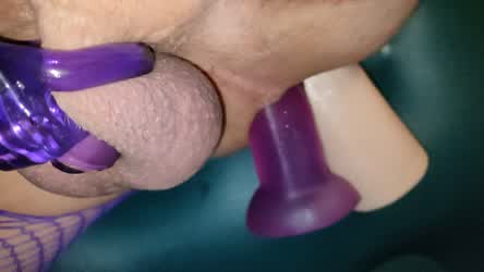 A dildo and a fist enter in a butt