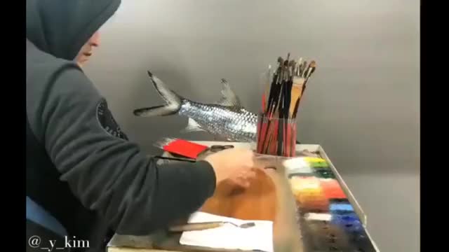 Time lapse shows artist create stunning portrait