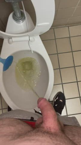 Peeing in a public bathroom