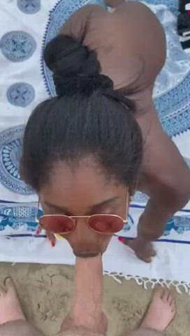 Shameless blowjob on a beach