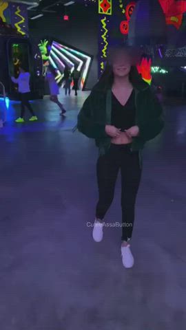 Dropping Them on a Playground as With Kids Behind Her