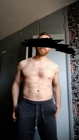 The grey sweatpants can't hide much...