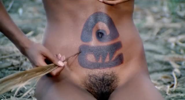 Laura Gemser Stroking Belly - Emanuelle and the Last Cannibals - Zoomed Up To Face