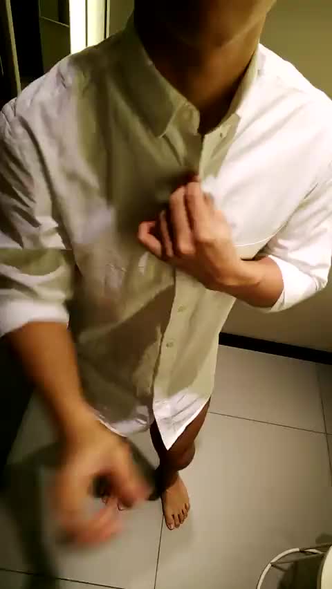 Sexy Asian boy stripping