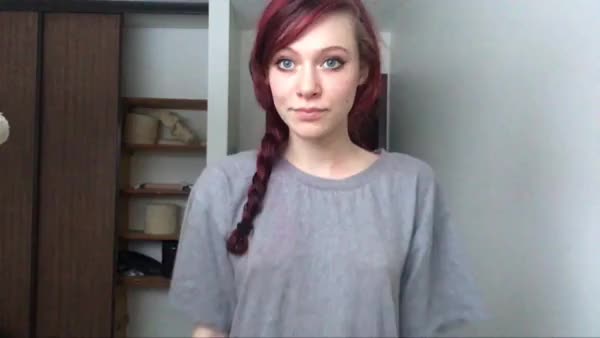 Redhead reveals boobs