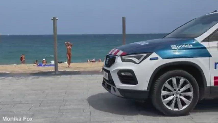 Showering nude at the beach in Barcelona