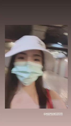 So this lesbian gook just groping her dyke GF boobs in public.