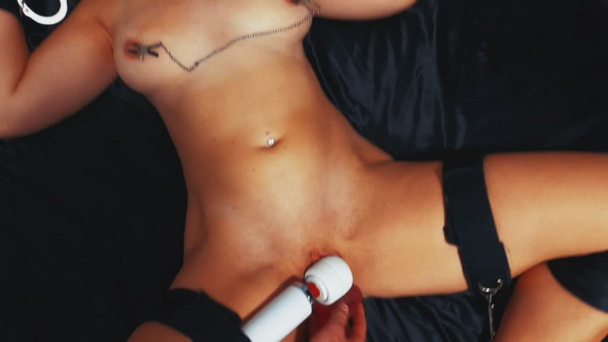 Sir strapped the wand to my clit, clamped my nipples, and stuffed a dildo in my pussy