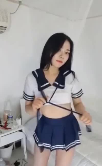 Schoolgirl with Baby Oil