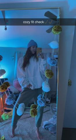 this tiny girl loves big sweatshirts