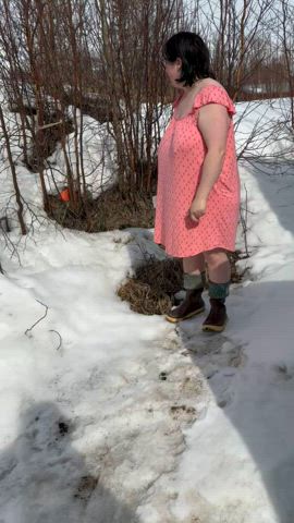 Wifey taking a squat beside the house