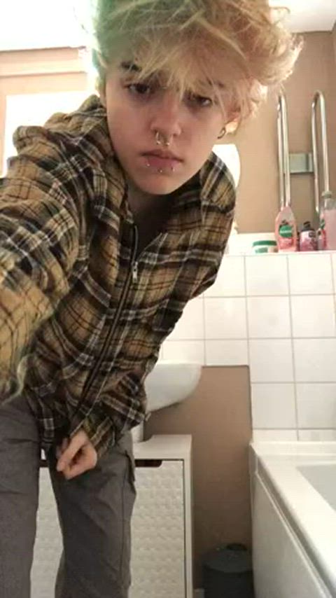 The young man stood in front of the mirror, his eyes wide with anticipation. He had