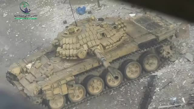 Syrian Armor engages rebel positions